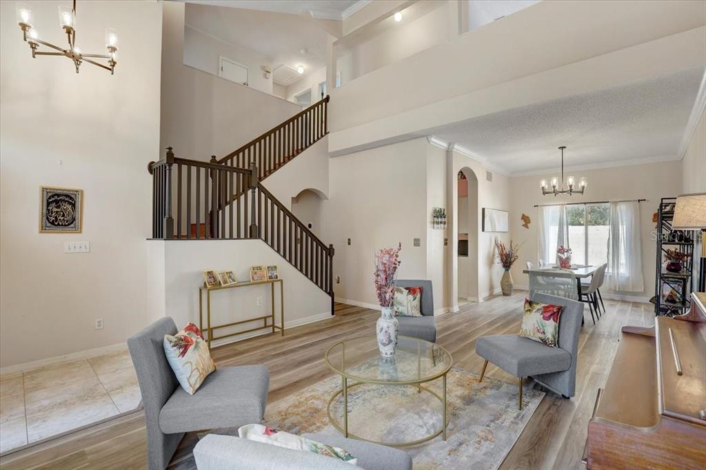 12657 Longcrest Drive Riverview, FL 33579 - Photo 6 of 55 a living room with furniture and wooden floor