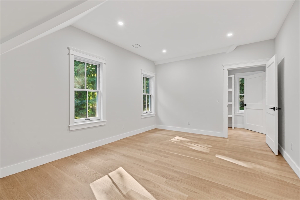 83 Eliot Street Natick, MA 01760 - Photo 20 of 30 an empty room with windows and closet
