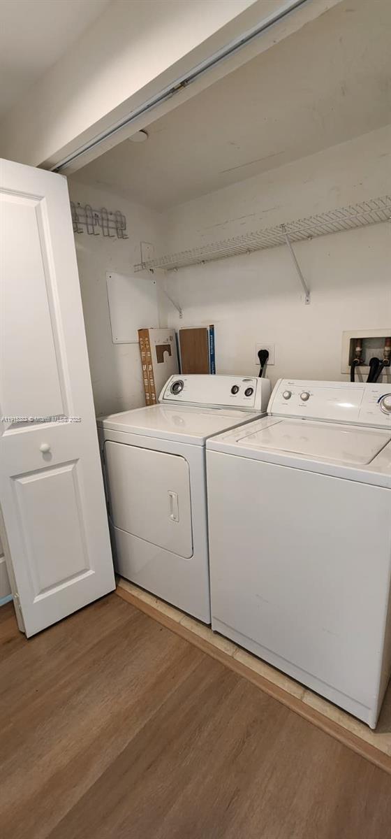 1250 South Miami Avenue, Unit 1911 Miami, FL 33130 - Photo 12 of 23 a utility room with dryer and washer