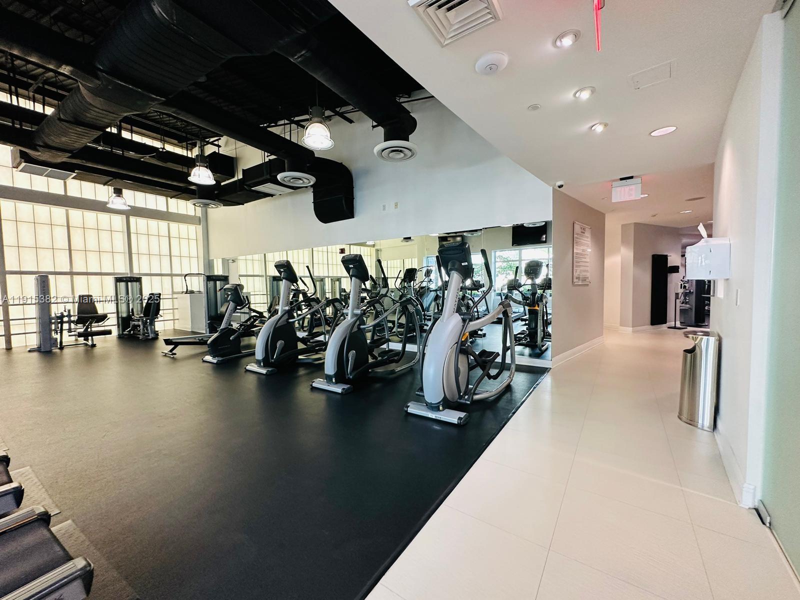 1250 South Miami Avenue, Unit 1911 Miami, FL 33130 - Photo 21 of 23 a view of a room with gym equipment