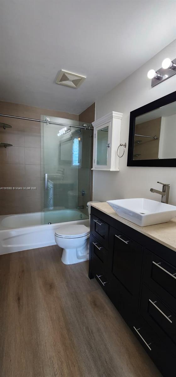 1250 South Miami Avenue, Unit 1911 Miami, FL 33130 - Photo 9 of 23 a bathroom with a double vanity sink and a large mirror