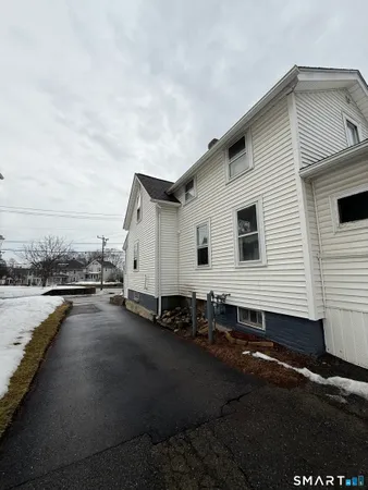 a view of a house with a side deck