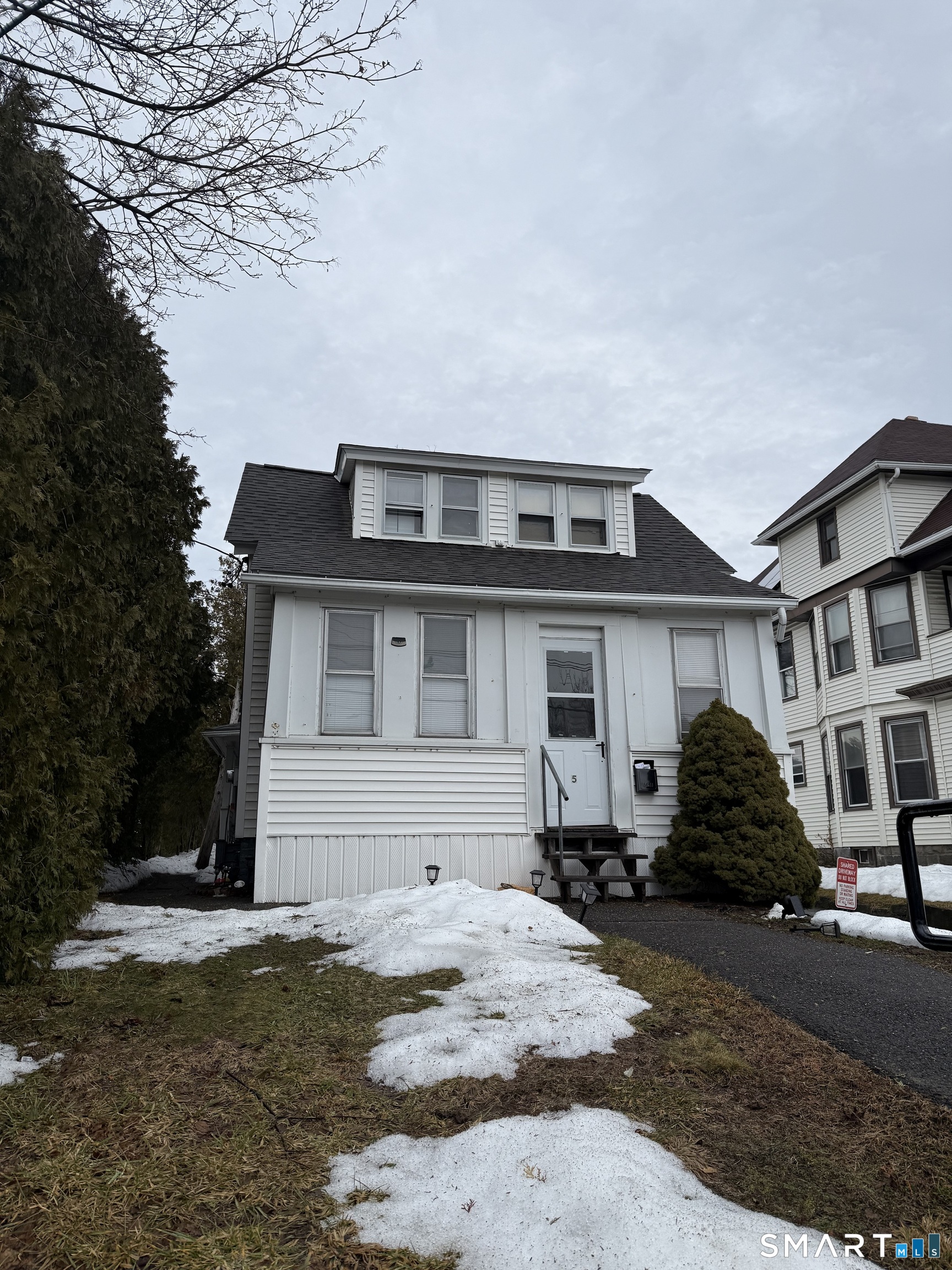 5 Winthrop Street Torrington, CT 06790 - Photo 15 of 18 a house that has a lot of windows on it