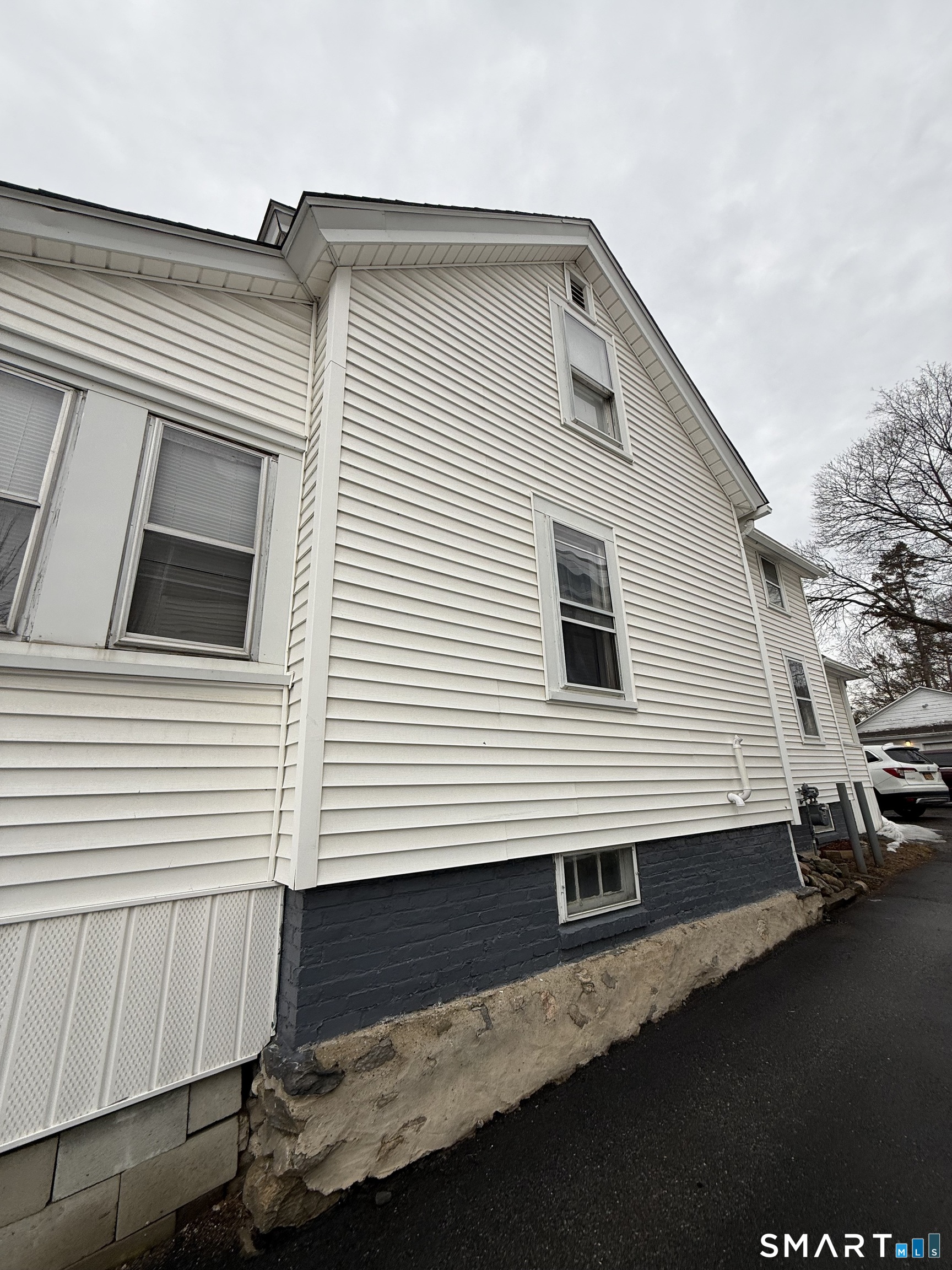 5 Winthrop Street Torrington, CT 06790 - Photo 18 of 18 a view of a house with a side deck
