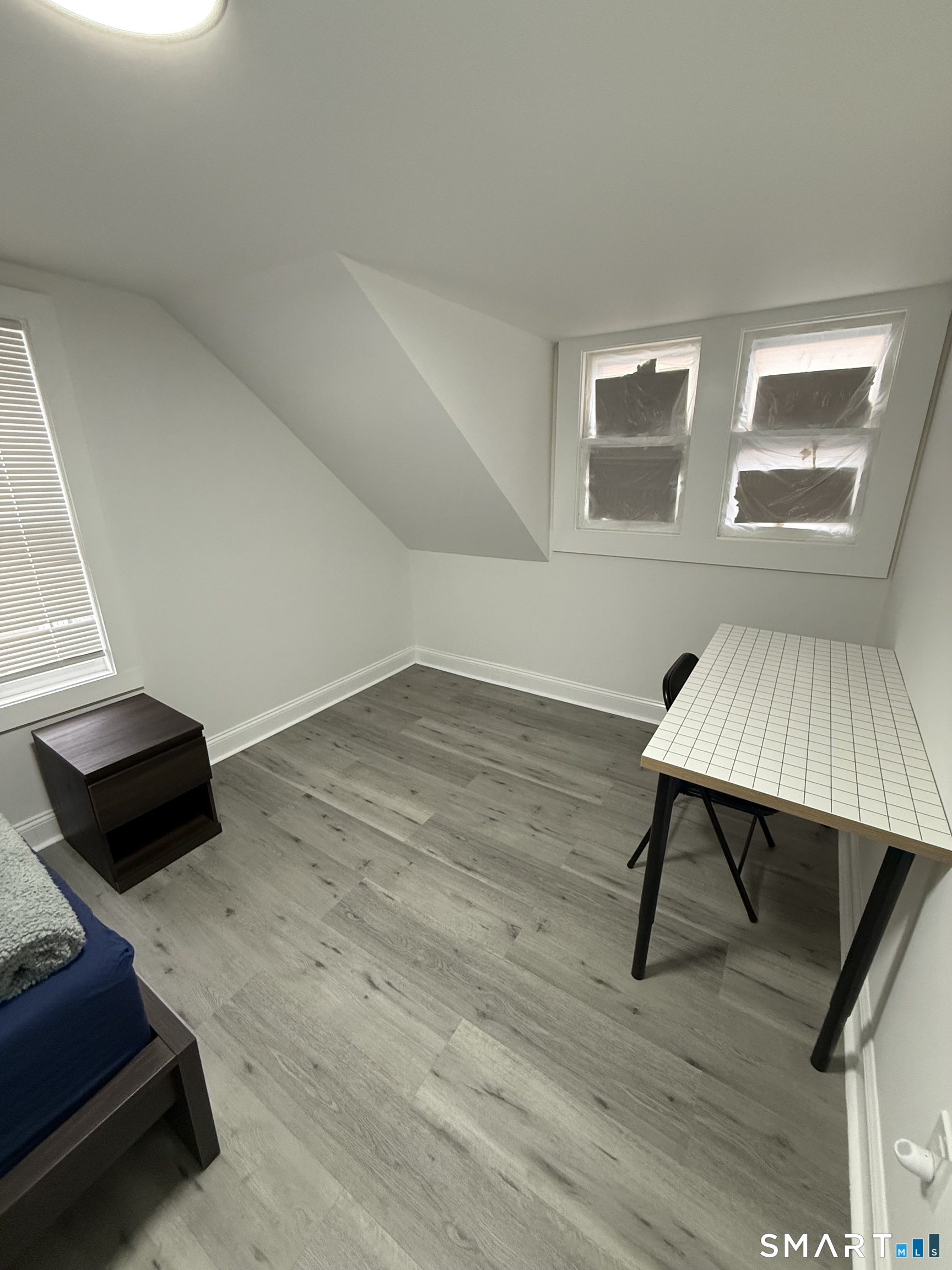 5 Winthrop Street Torrington, CT 06790 - Photo 5 of 18 a living room with a couch and a window