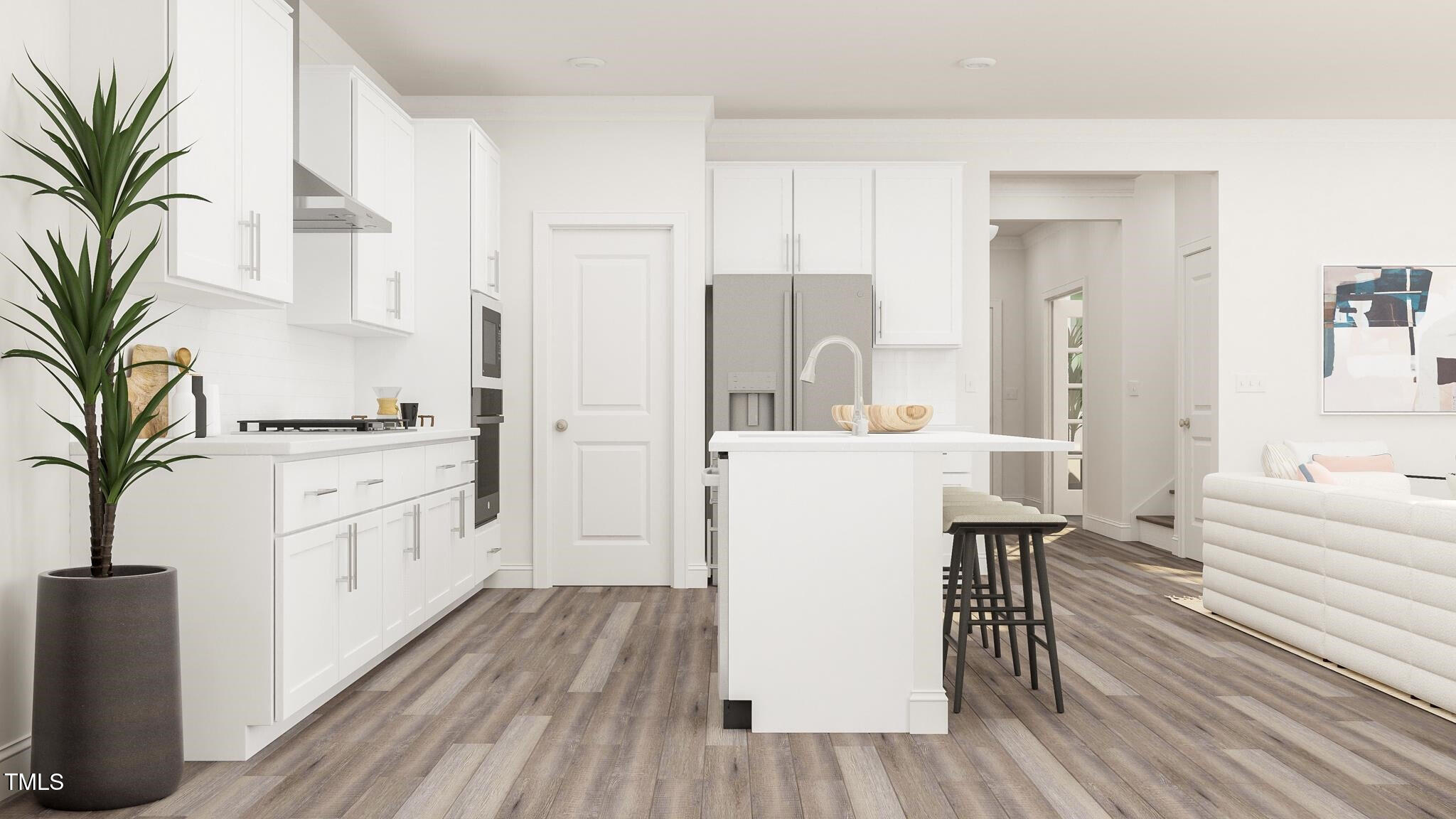 336 Calvander Lane Apex, NC 27539 - Photo 17 of 38 a kitchen with white cabinets and white appliances