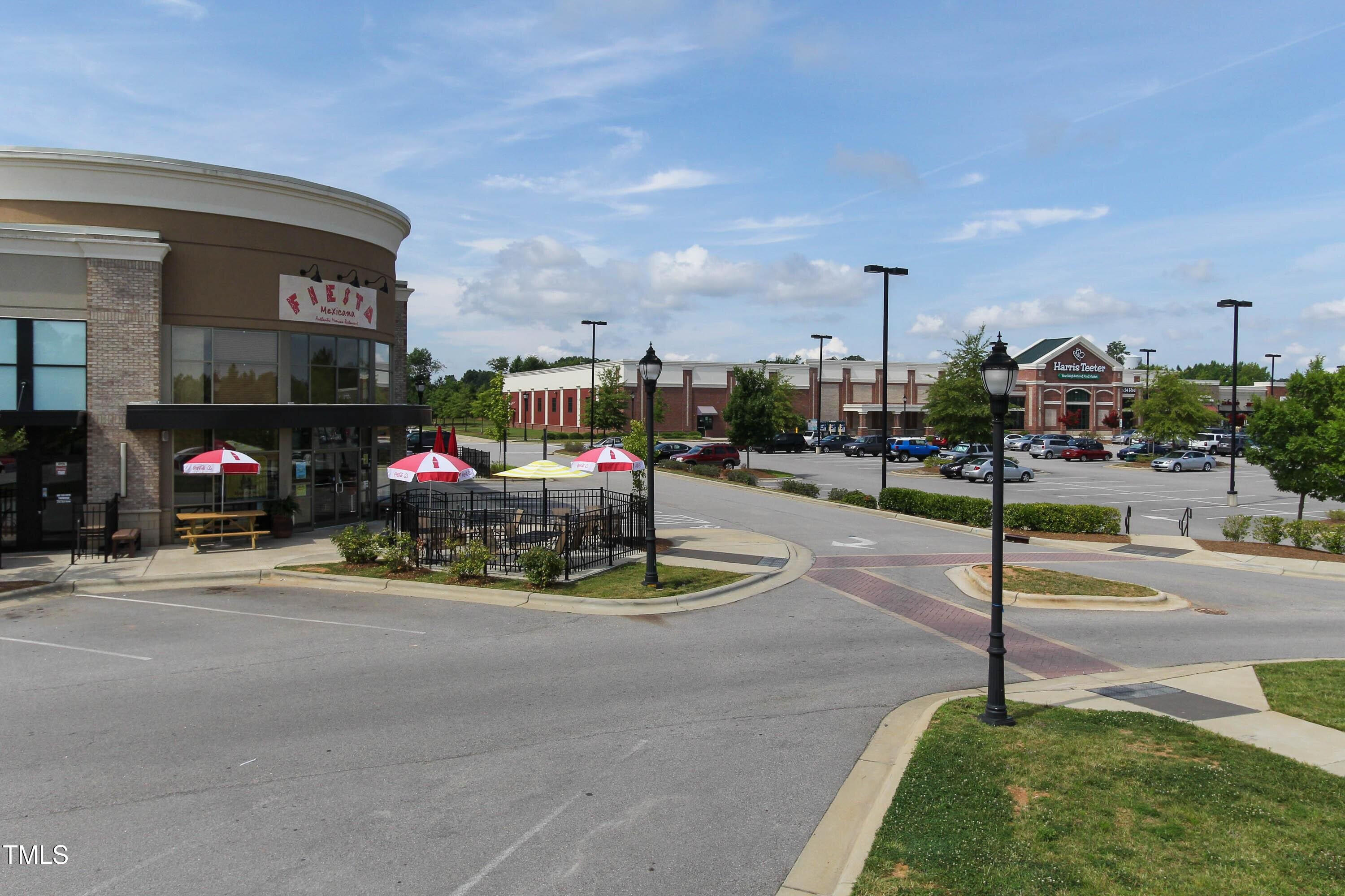 336 Calvander Lane Apex, NC 27539 - Photo 27 of 38 a view of a street with cars