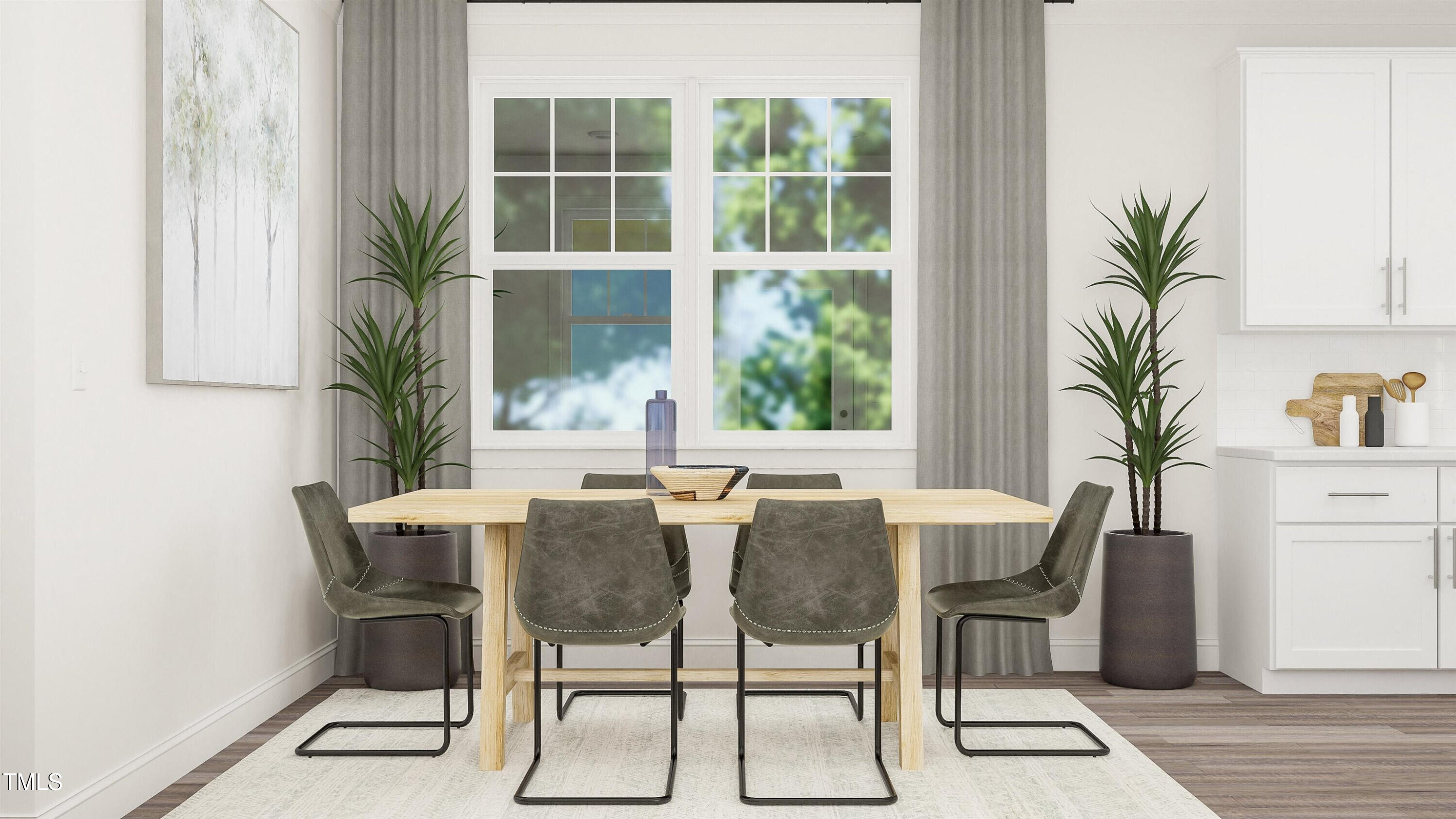 336 Calvander Lane Apex, NC 27539 - Photo 10 of 38 a view of a dining room with furniture and a window