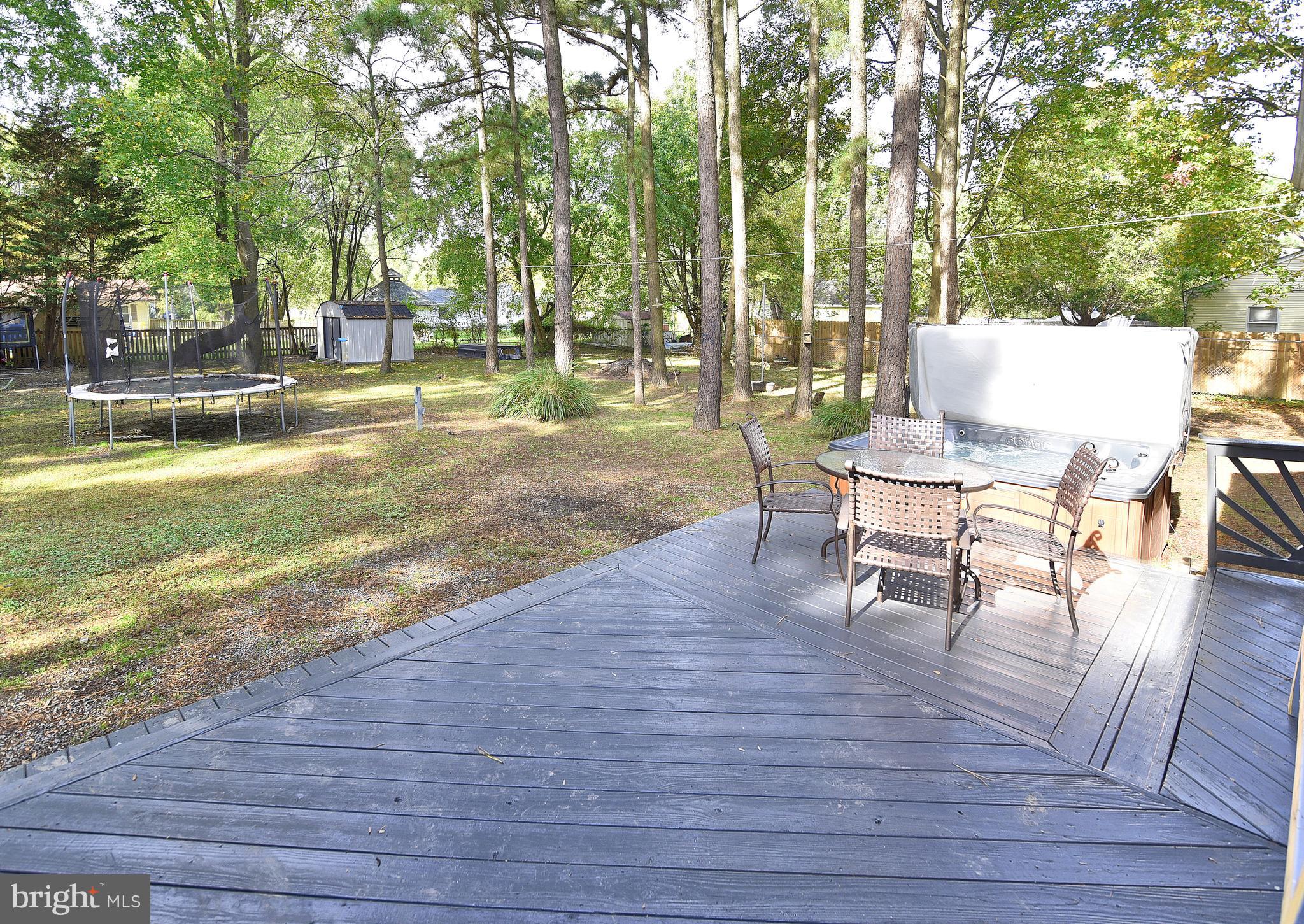 212 Long Point Road Stevensville, MD 21666 - Photo 8 of 46 Private back deck backing to partial woods