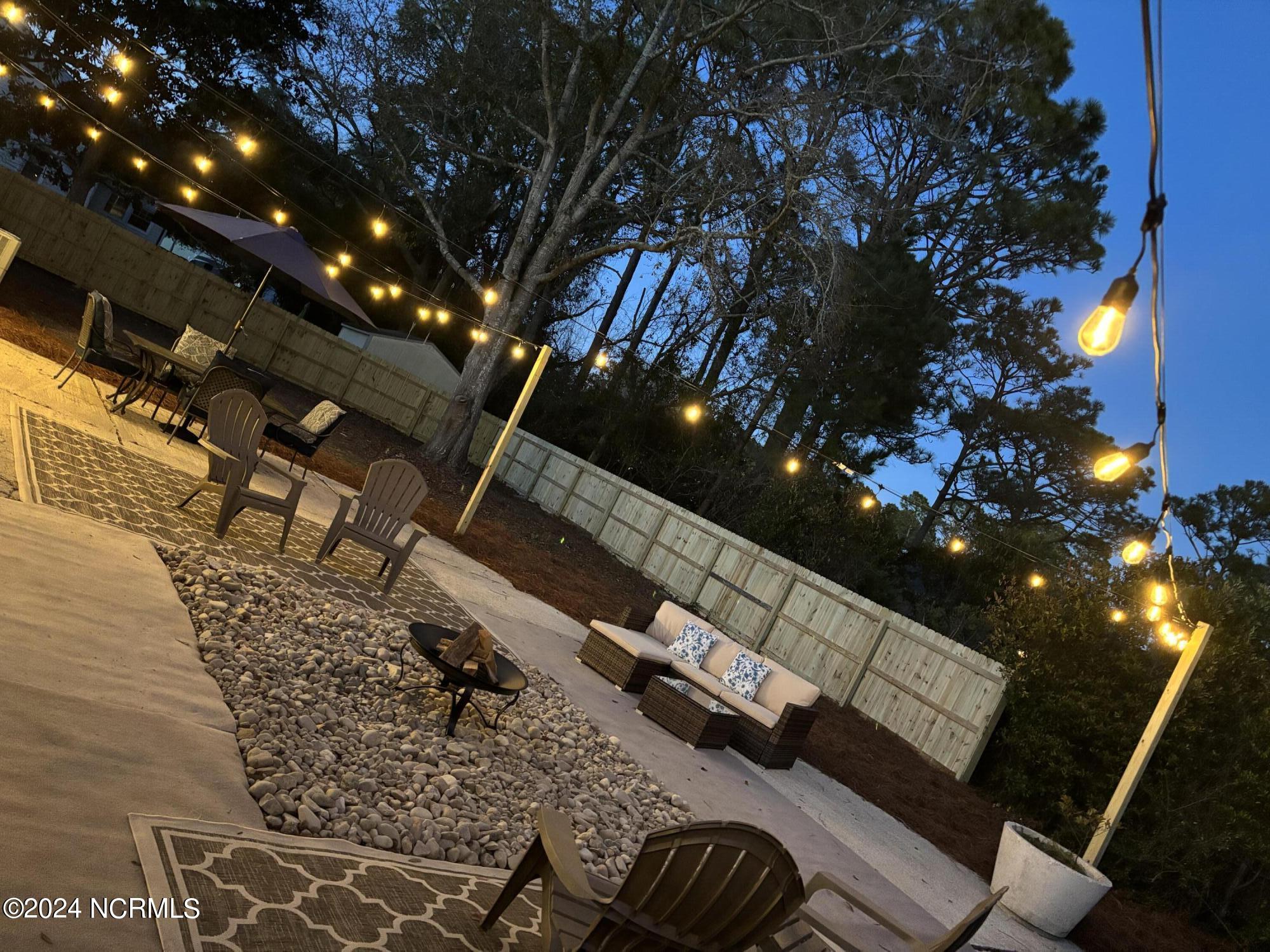 229 2 Chopt Road Wilmington, NC 28405 - Photo 51 of 73 Evening party lights, fire pit!