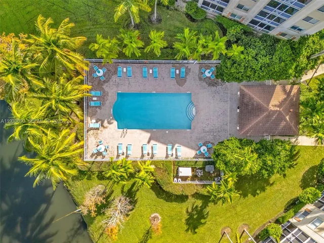 a view of a kitchen and refrigerator in a kitchen