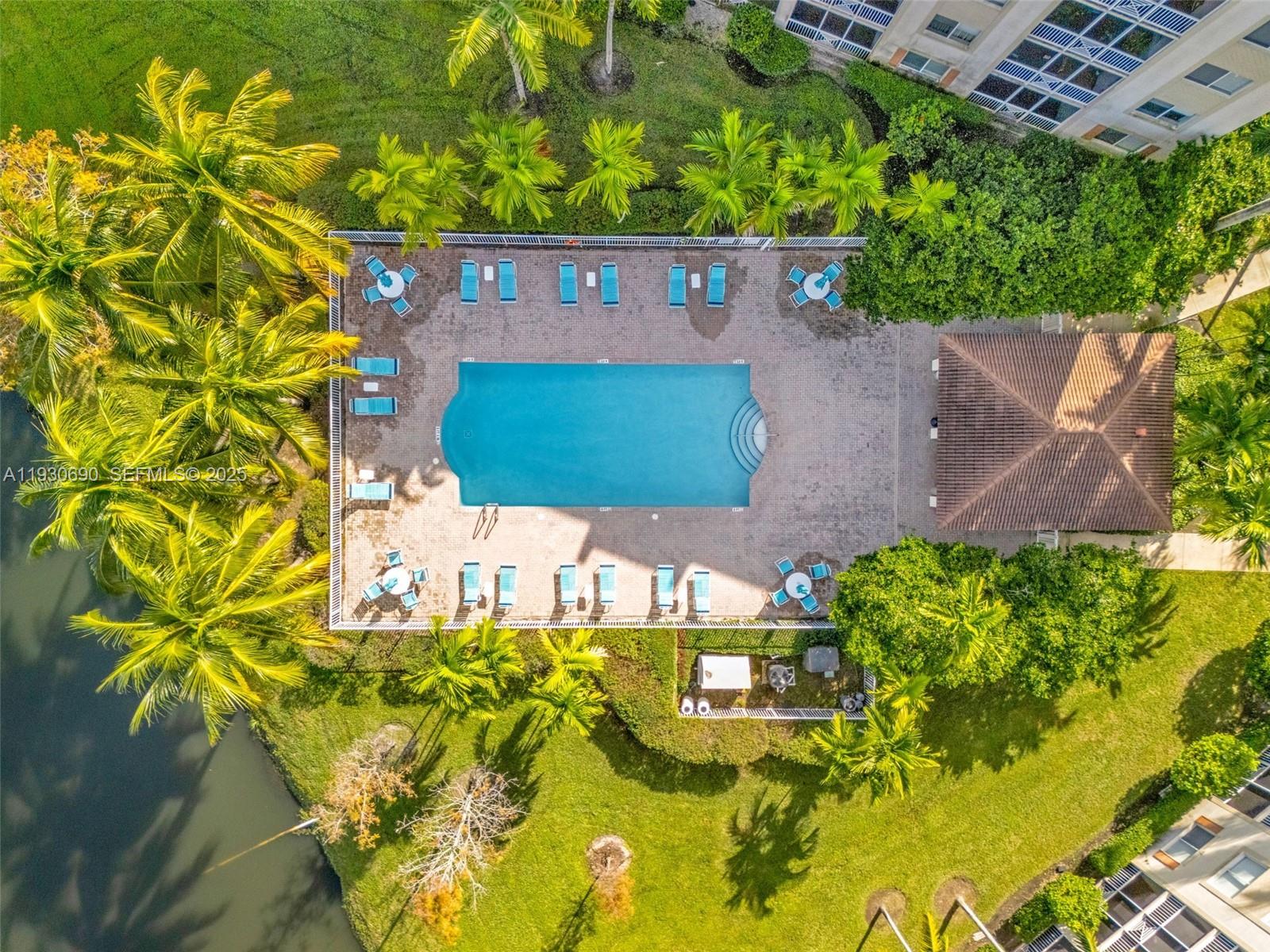 3600 Oaks Clubhouse Drive, Unit 103 Pompano Beach, FL 33069 - Photo 5 of 16 a view of an outdoor space