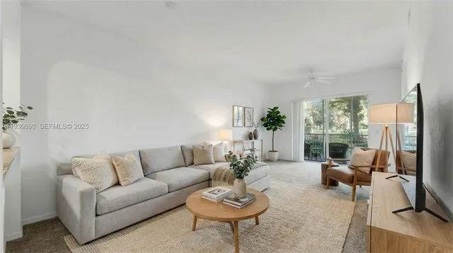 a view of an empty room with a balcony
