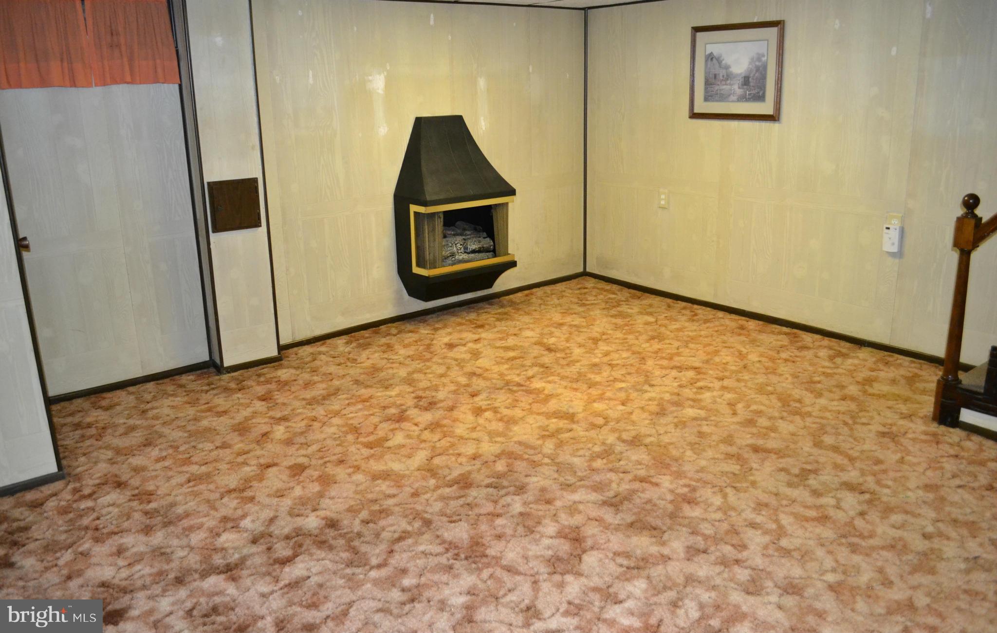 203 Grove Park Road Baltimore, MD 21225 - Photo 16 of 23 a view of a storage in a room