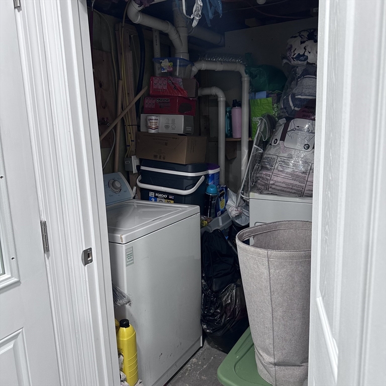1163 Whipple Road Tewksbury, MA 01876 - Photo 17 of 31 a utility room with dryer and washer