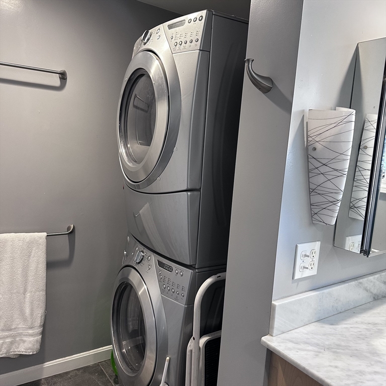 1163 Whipple Road Tewksbury, MA 01876 - Photo 10 of 31 a utility room with dryer and washer
