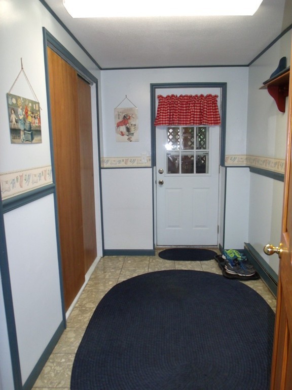 24 Beebe Road Monson, MA 01057 - Photo 27 of 30 a view of a hallway with workspace