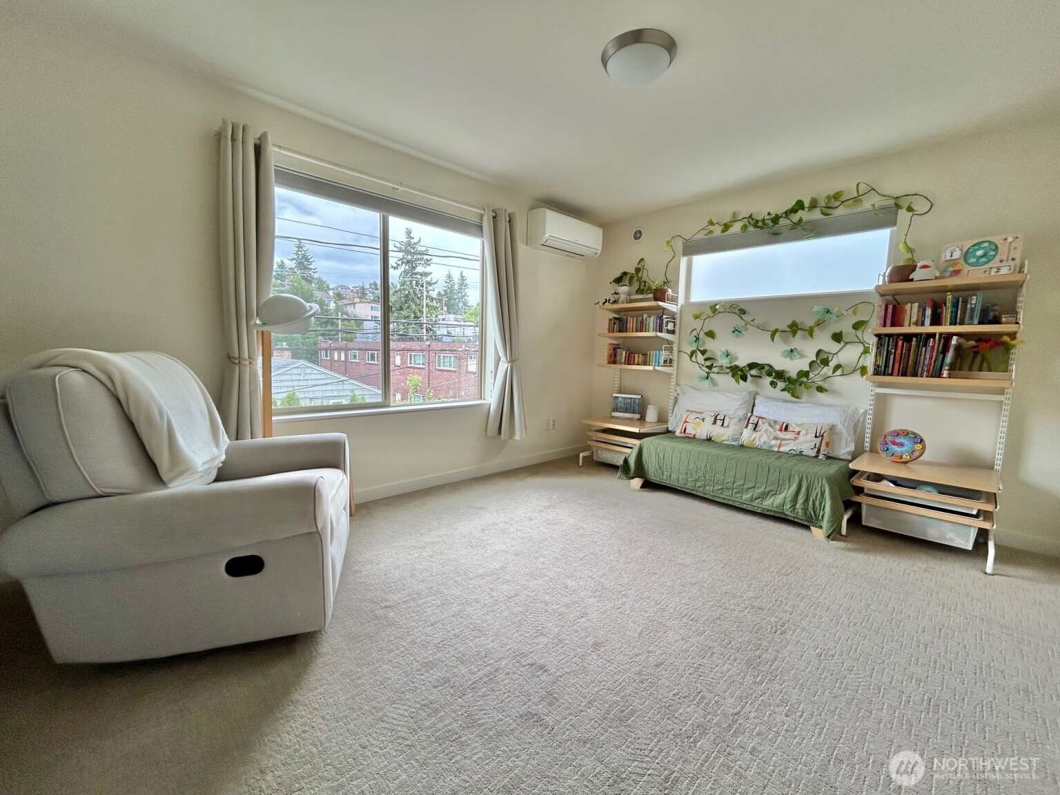 4852 40th Avenue Southwest, Unit B Seattle, WA 98116 - Photo 15 of 25 a living room with furniture and a window