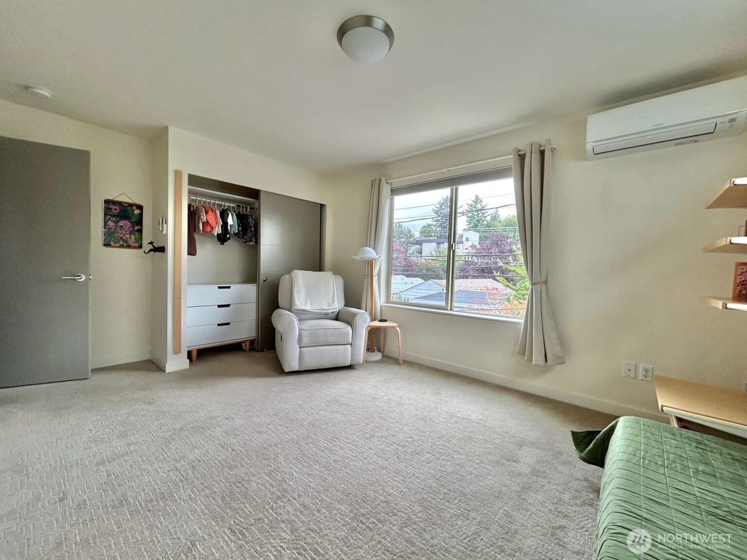 4852 40th Avenue Southwest, Unit B Seattle, WA 98116 - Photo 16 of 25 a living room with furniture and a window