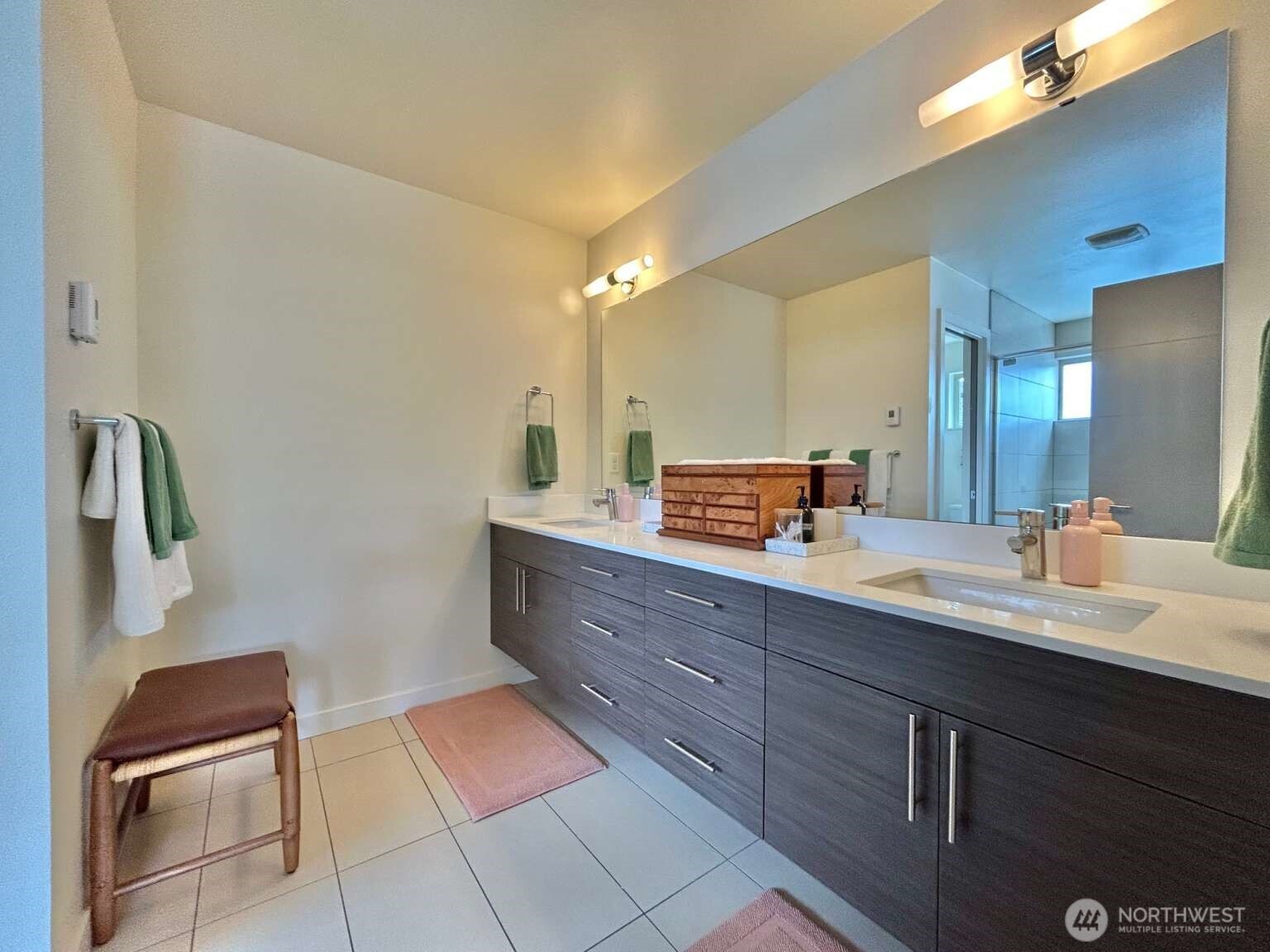 4852 40th Avenue Southwest, Unit B Seattle, WA 98116 - Photo 21 of 25 a bathroom with a sink and a mirror
