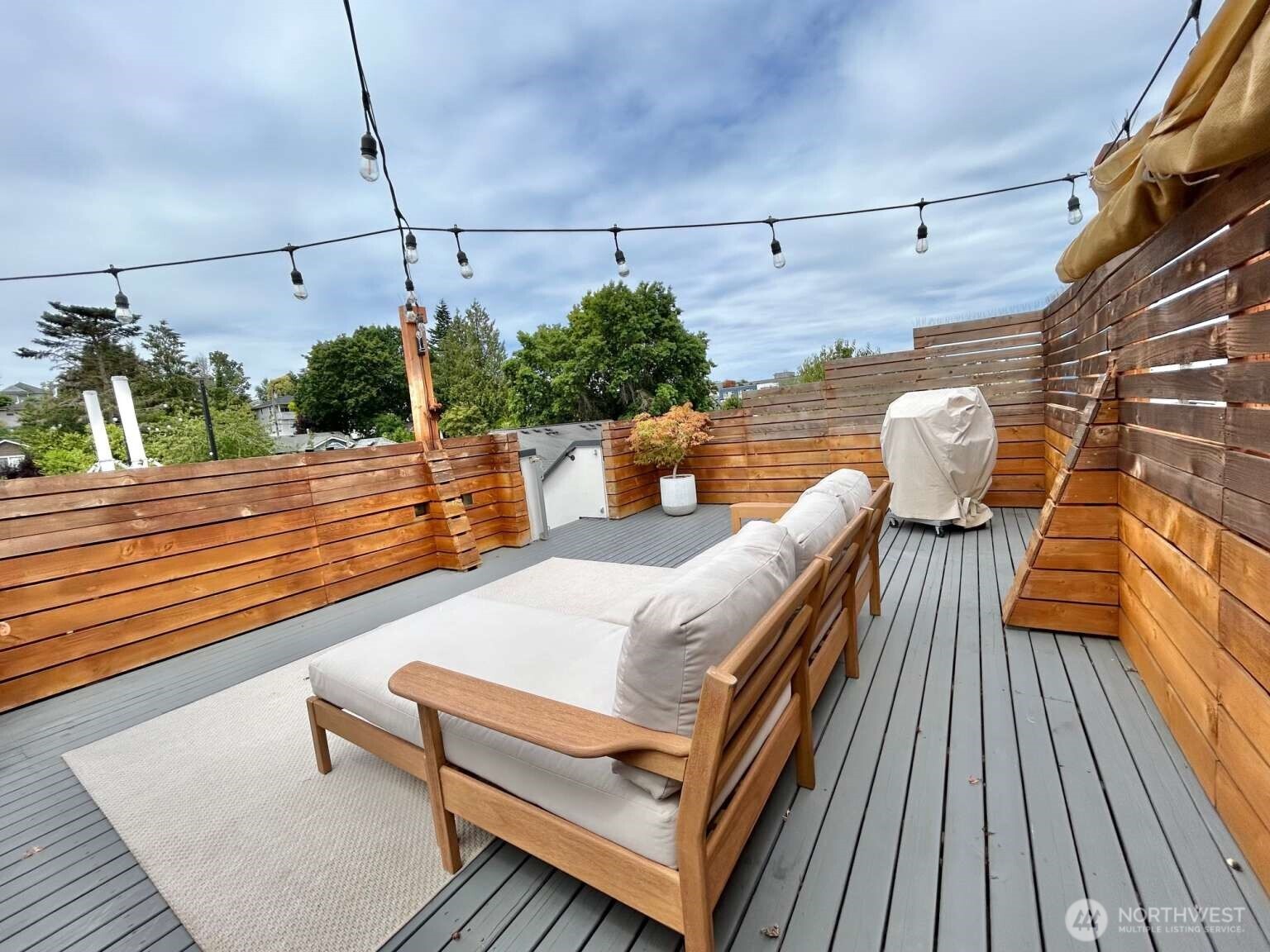 4852 40th Avenue Southwest, Unit B Seattle, WA 98116 - Photo 25 of 25 a view of a terrace with seating space