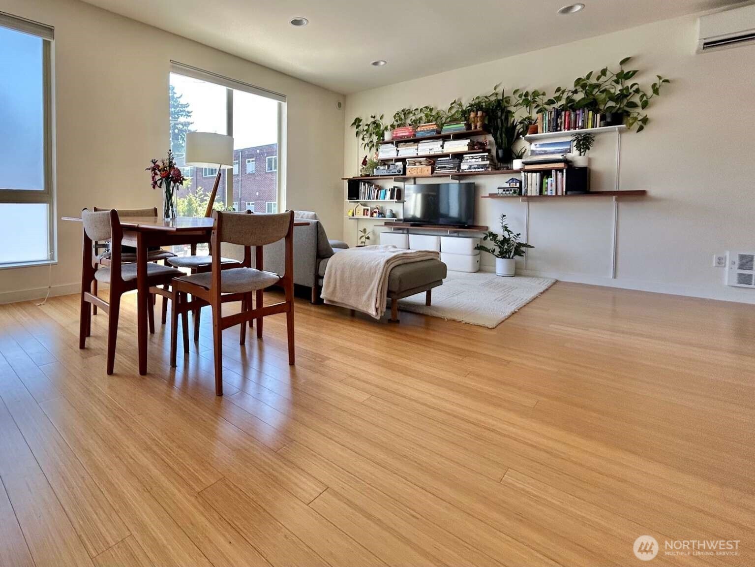 4852 40th Avenue Southwest, Unit B Seattle, WA 98116 - Photo 5 of 25 a living room with furniture and a wooden floor