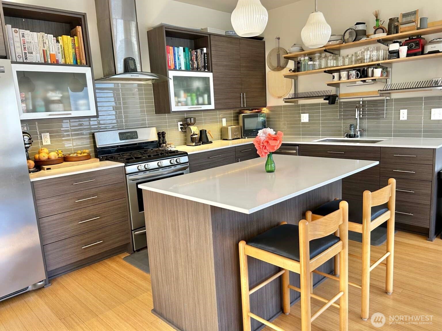4852 40th Avenue Southwest, Unit B Seattle, WA 98116 - Photo 8 of 25 a kitchen with a sink cabinets and appliances