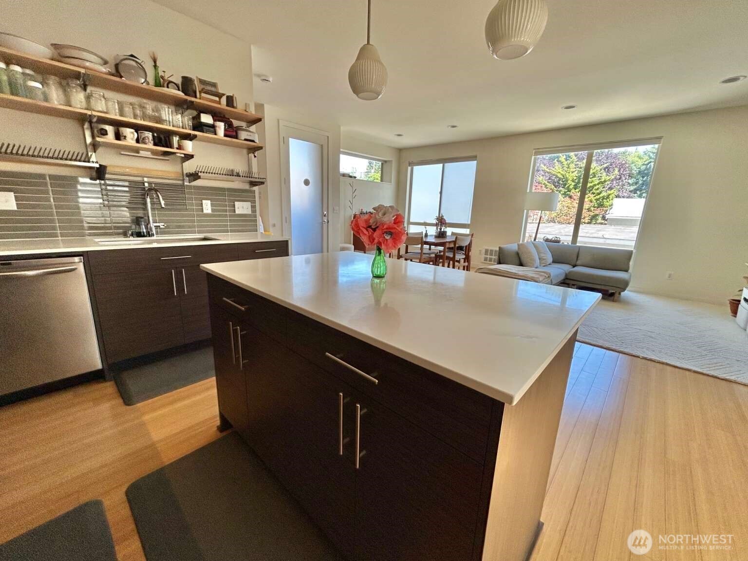 4852 40th Avenue Southwest, Unit B Seattle, WA 98116 - Photo 9 of 25 a kitchen with counter top space and living room