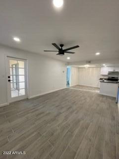 2855 South Ext Road, Unit 135 Mesa, AZ 85210 - Photo 4 of 19 a view of a livingroom with a stove top oven