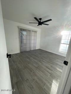 2855 South Ext Road, Unit 135 Mesa, AZ 85210 - Photo 6 of 19 an empty room with windows