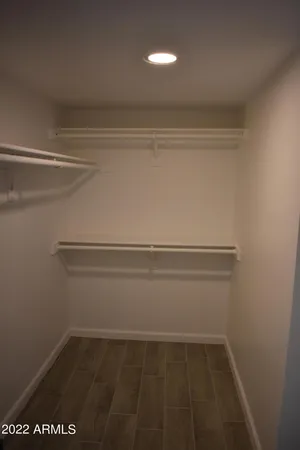 a view of small space with racks on the wall