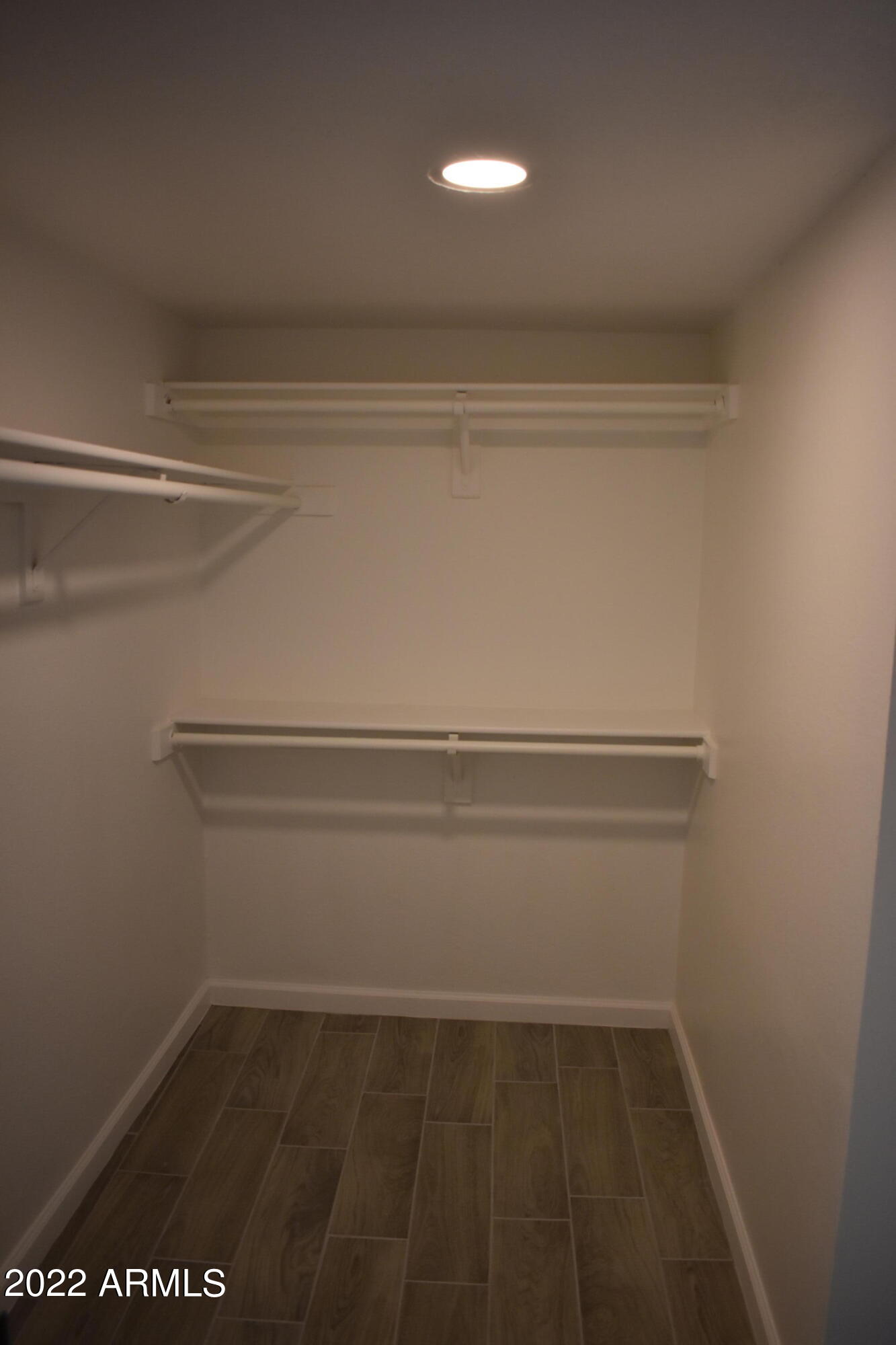 2855 South Ext Road, Unit 135 Mesa, AZ 85210 - Photo 9 of 19 a view of small space with racks on the wall