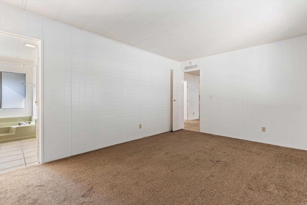 650 South Rancho Santa Fe Road, Unit 312 San Marcos, CA 92078 - Photo 22 of 53 an empty room with a bathroom