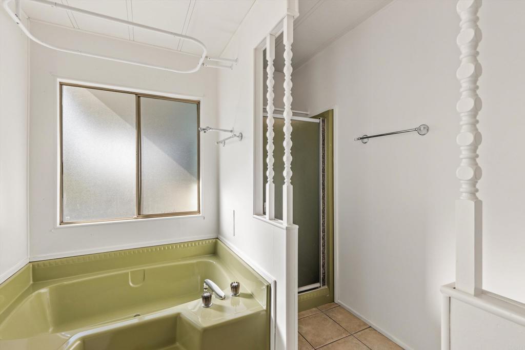 650 South Rancho Santa Fe Road, Unit 312 San Marcos, CA 92078 - Photo 24 of 53 a bathroom with a tub and a shower