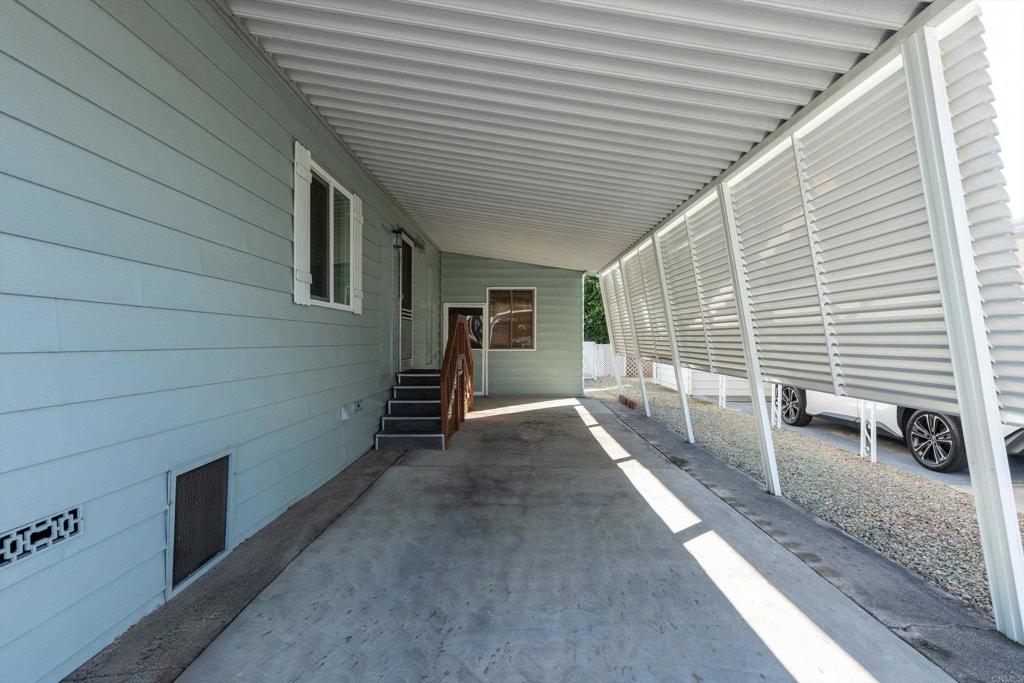 650 South Rancho Santa Fe Road, Unit 312 San Marcos, CA 92078 - Photo 35 of 53 a view of a house with a porch