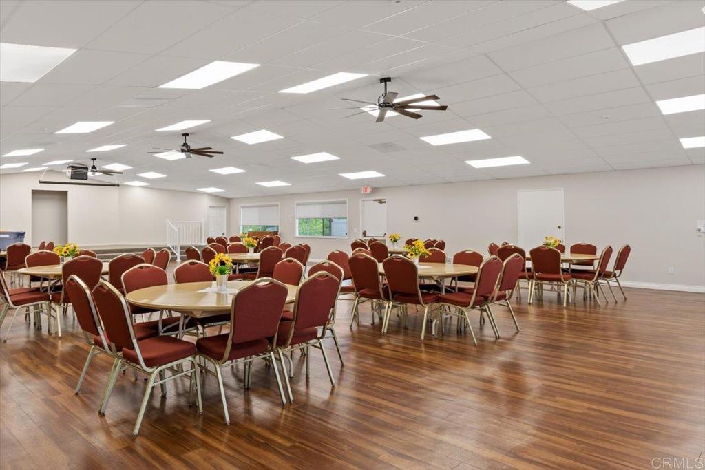 650 South Rancho Santa Fe Road, Unit 312 San Marcos, CA 92078 - Photo 43 of 53 a group of people sitting at tables in a room