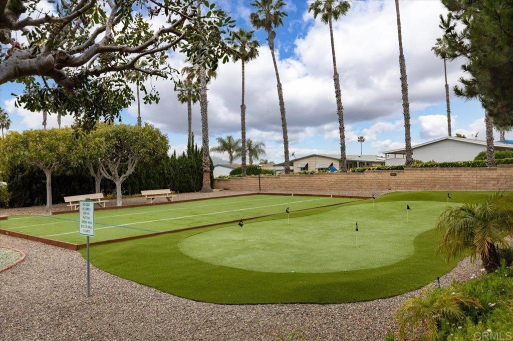 650 South Rancho Santa Fe Road, Unit 312 San Marcos, CA 92078 - Photo 48 of 53 a view of a swimming pool with a yard
