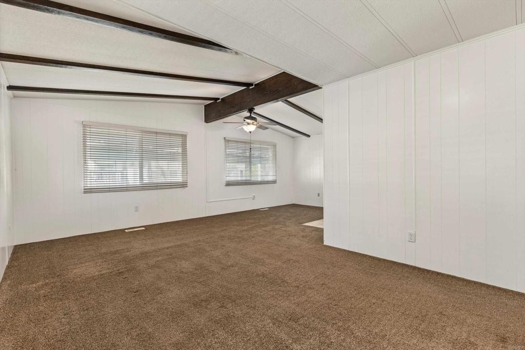 650 South Rancho Santa Fe Road, Unit 312 San Marcos, CA 92078 - Photo 9 of 53 an empty room with windows