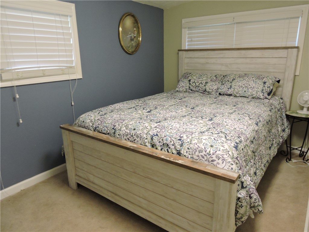1901 Hattons Ford Road Townville, SC 29689 - Photo 14 of 33 A well-proportioned bedroom with ample natural light from generous windows.
