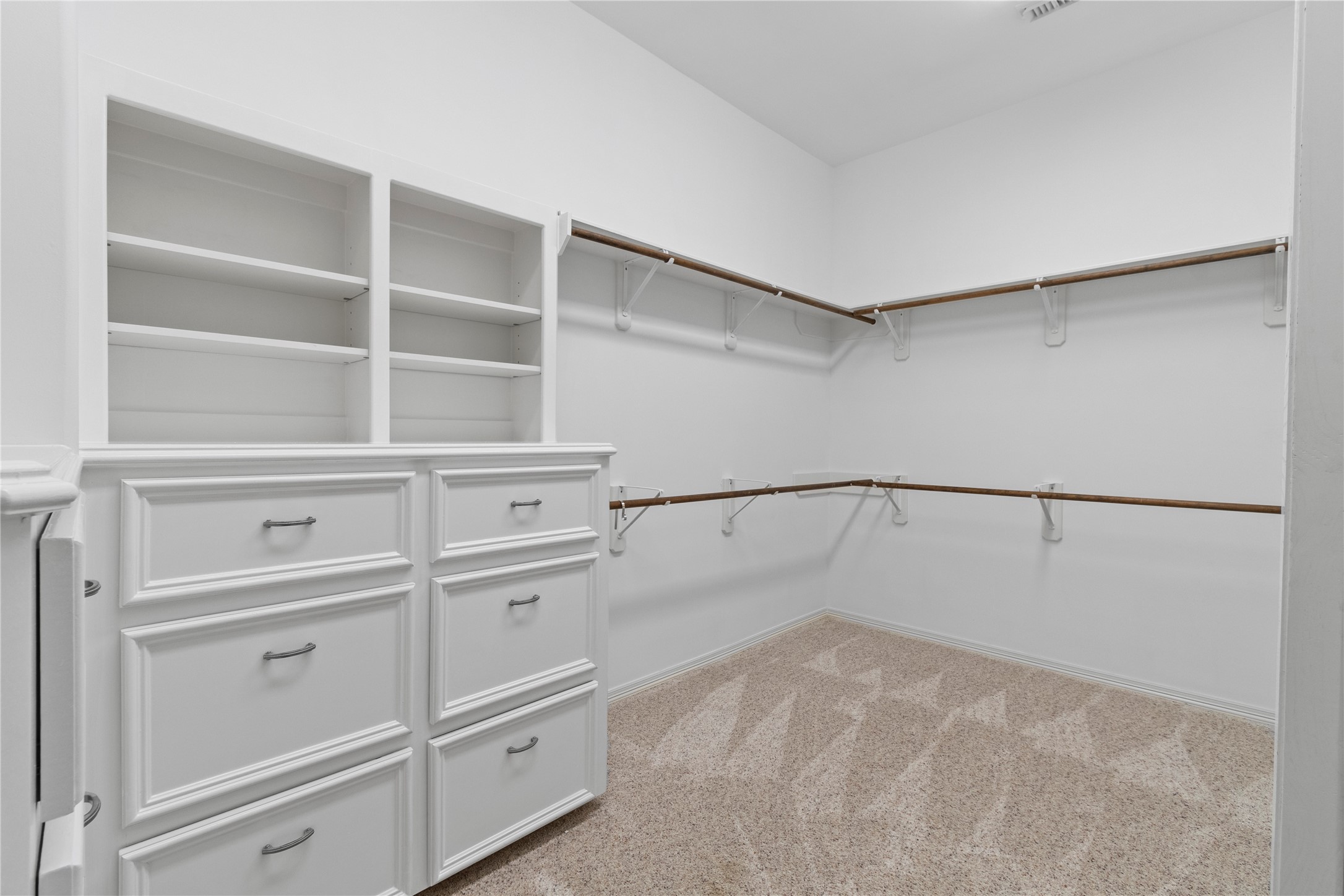 16626 Lafone Drive Spring, TX 77379 - Photo 21 of 42 HUGE primary closet with built-ins. JUST painted.