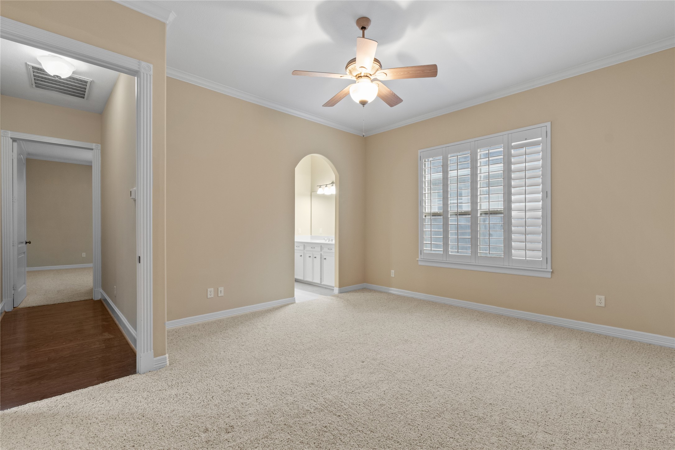 16626 Lafone Drive Spring, TX 77379 - Photo 22 of 42 A split plan - two of the 2ndary bedrooms joined by a jack and jill bathroom. Both bedrooms have plantation shutters and ceiling fans.