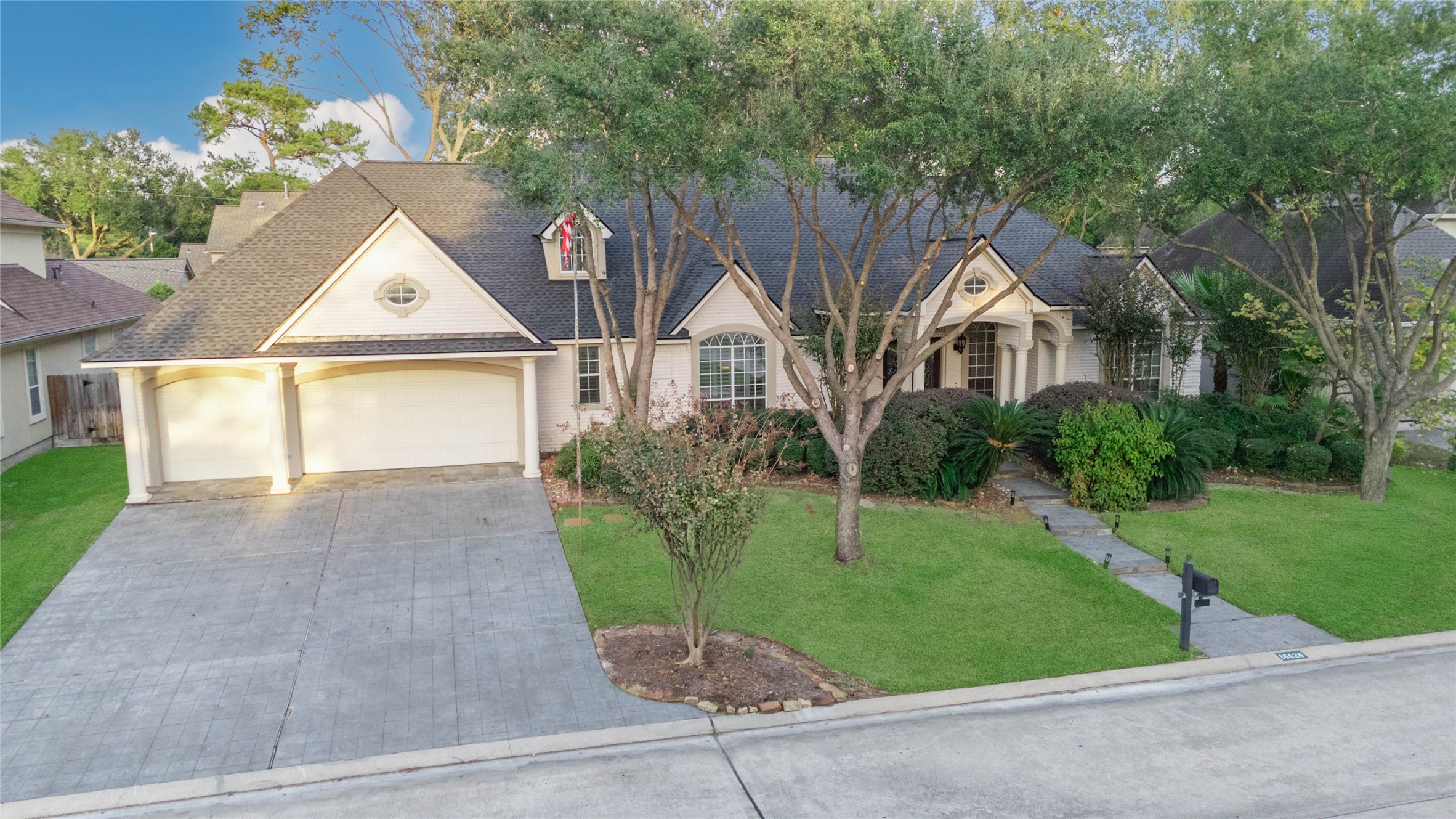 16626 Lafone Drive Spring, TX 77379 - Photo 36 of 42 Did you notice the 3 car wide driveway and garage? Can you believe it is also extra-long?