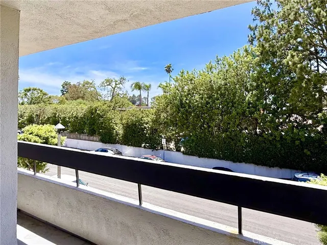 a kitchen with granite countertop cabinets and steel stainless steel appliances
