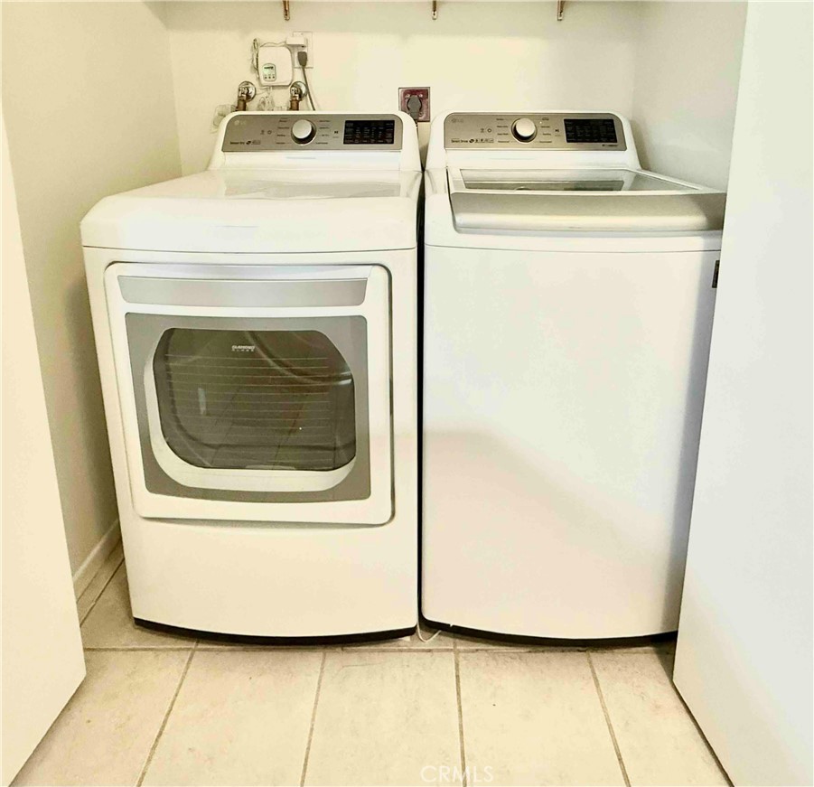 5965 Peacock Ridge Road, Unit 301 Rancho Palos Verdes, CA 90275 - Photo 29 of 31 a utility room with a washer and dryer