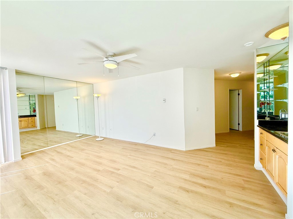 5965 Peacock Ridge Road, Unit 301 Rancho Palos Verdes, CA 90275 - Photo 8 of 31 a view of an empty room with kitchen and a window