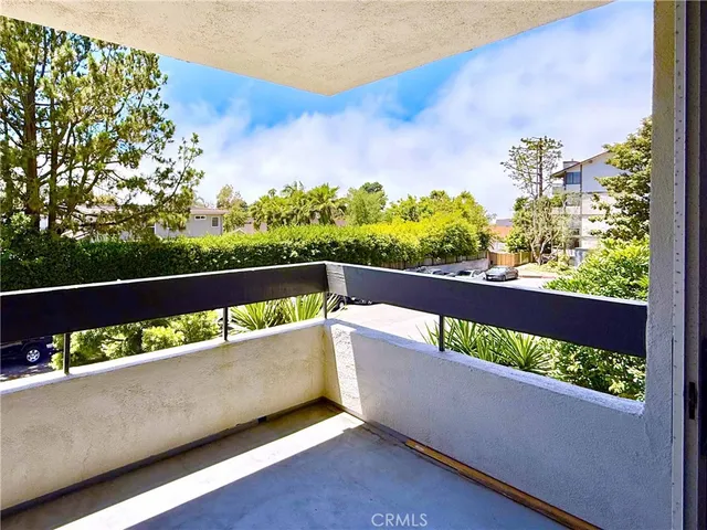 a kitchen with granite countertop a sink and a stove