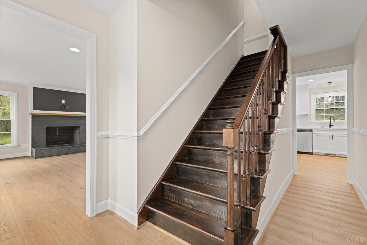 2252 Coffee Road Lynchburg, VA 24503 - Photo 17 of 93 a view of an entryway with wooden floor and a livingroom