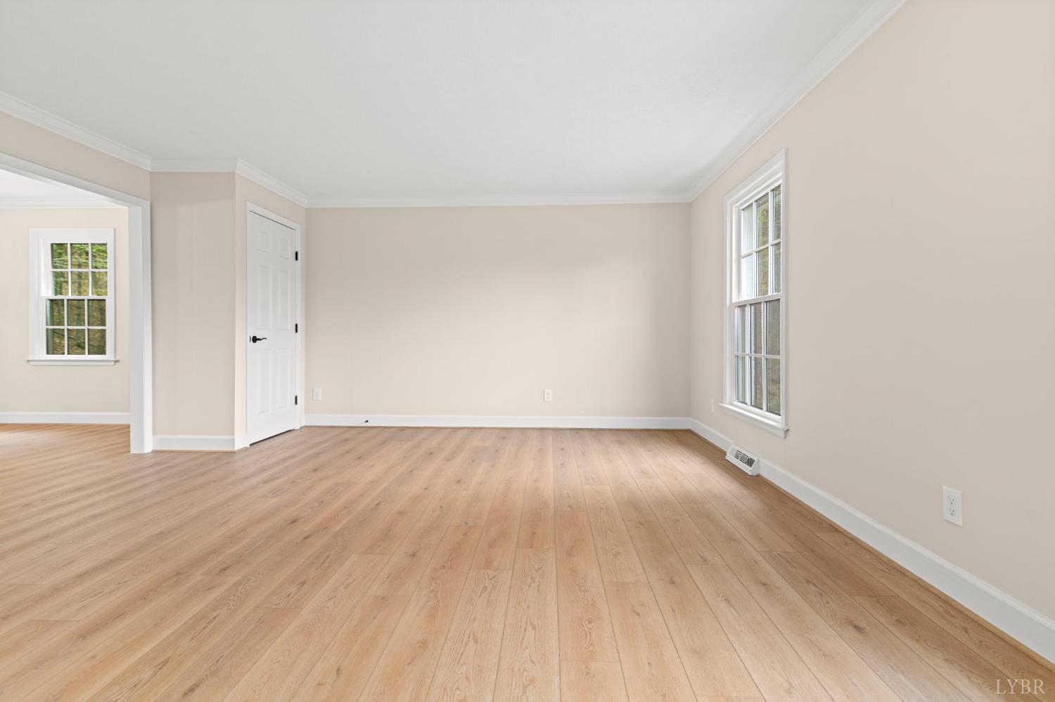 2252 Coffee Road Lynchburg, VA 24503 - Photo 19 of 93 an empty room with wooden floor and windows