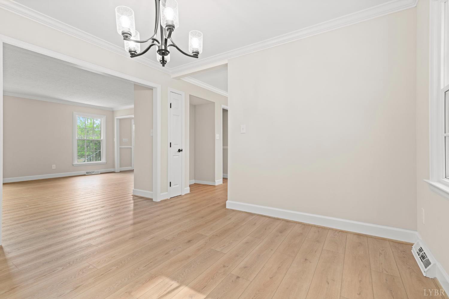 2252 Coffee Road Lynchburg, VA 24503 - Photo 26 of 93 wooden floor in an empty room with a window
