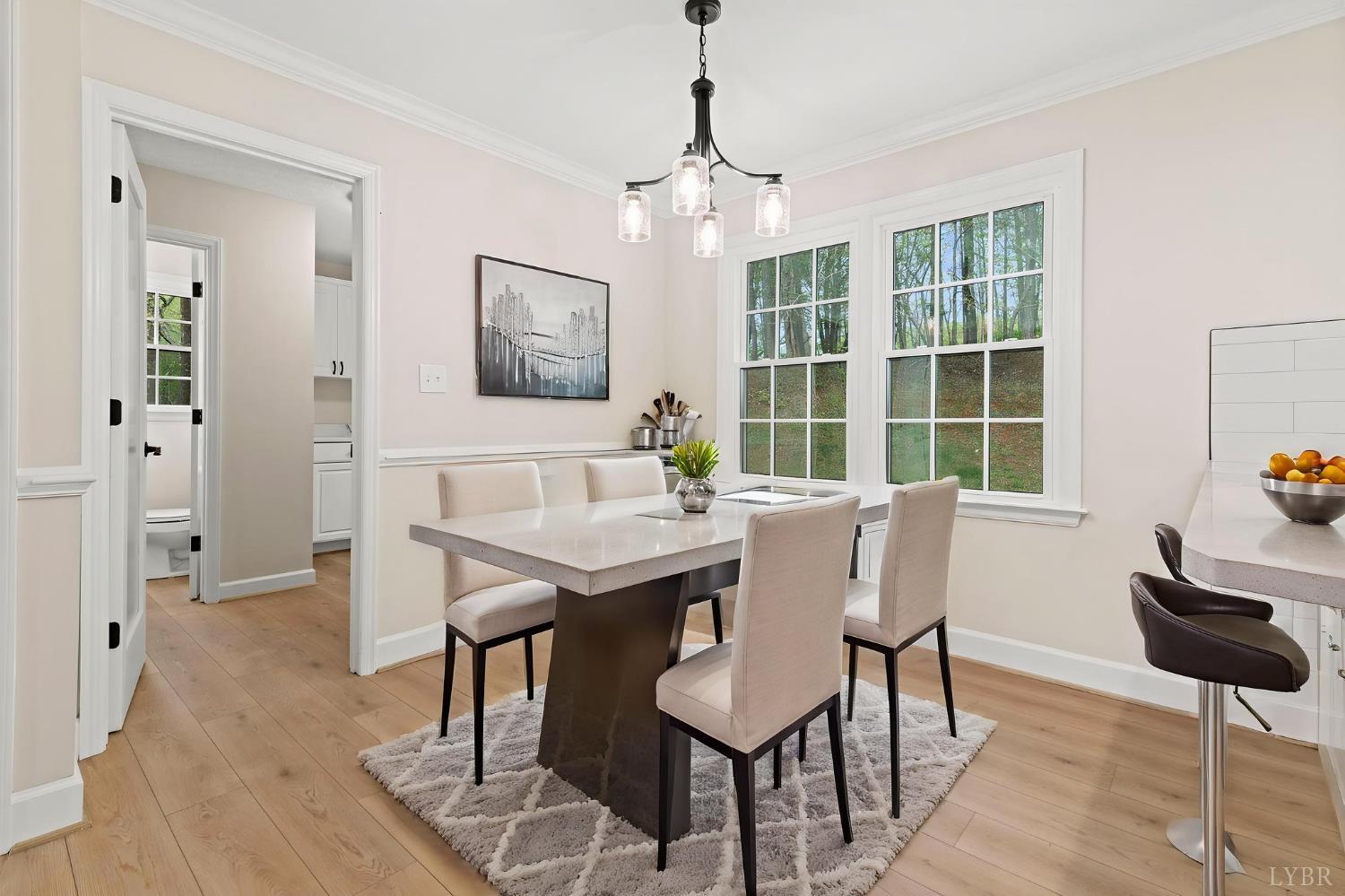 2252 Coffee Road Lynchburg, VA 24503 - Photo 33 of 93 a view of a dining room with furniture window and wooden floor